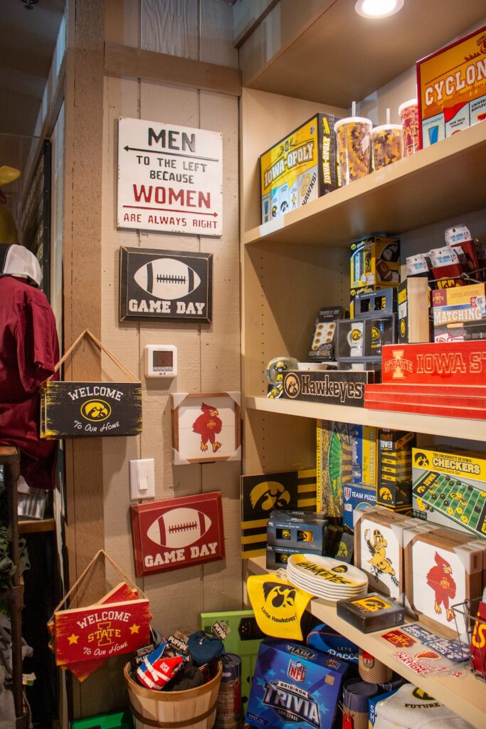 Machine Shed gift shop football team themed games, wall art, and coasters