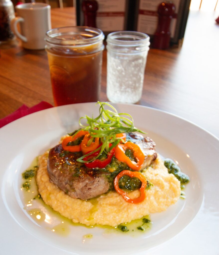 Machine Shed Porktober Harvest Ribeye Pork Parmesan polenta sweet corn chimichurri and pickled peppers